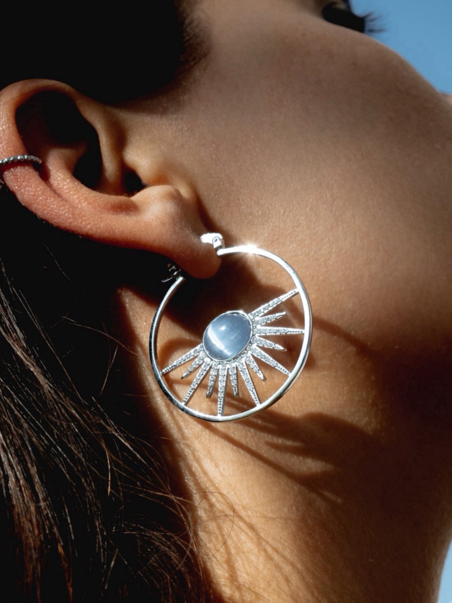 Earrings hoops w/blue stone silver