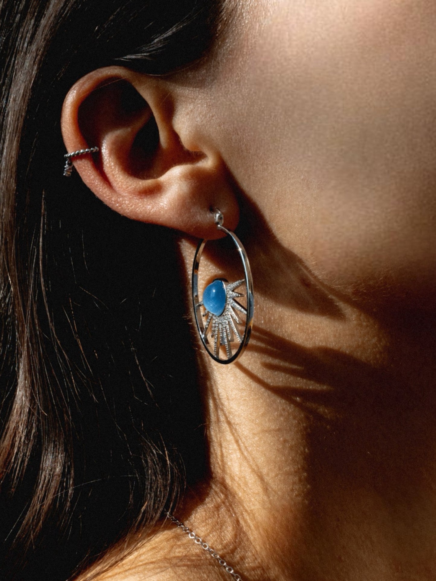 Earrings hoops w/blue stone silver