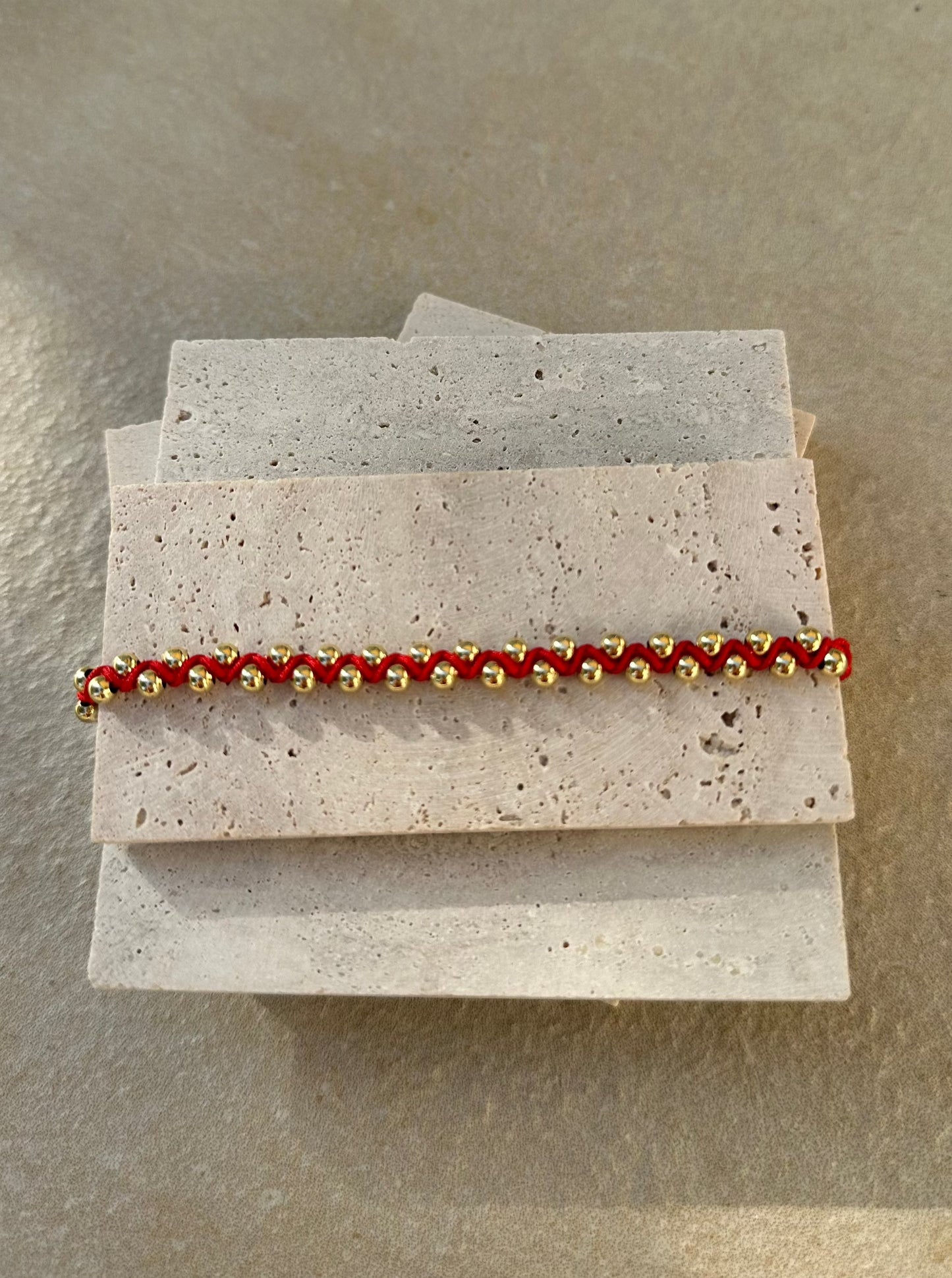 Braided bracelet medium 'Red w/gold details'