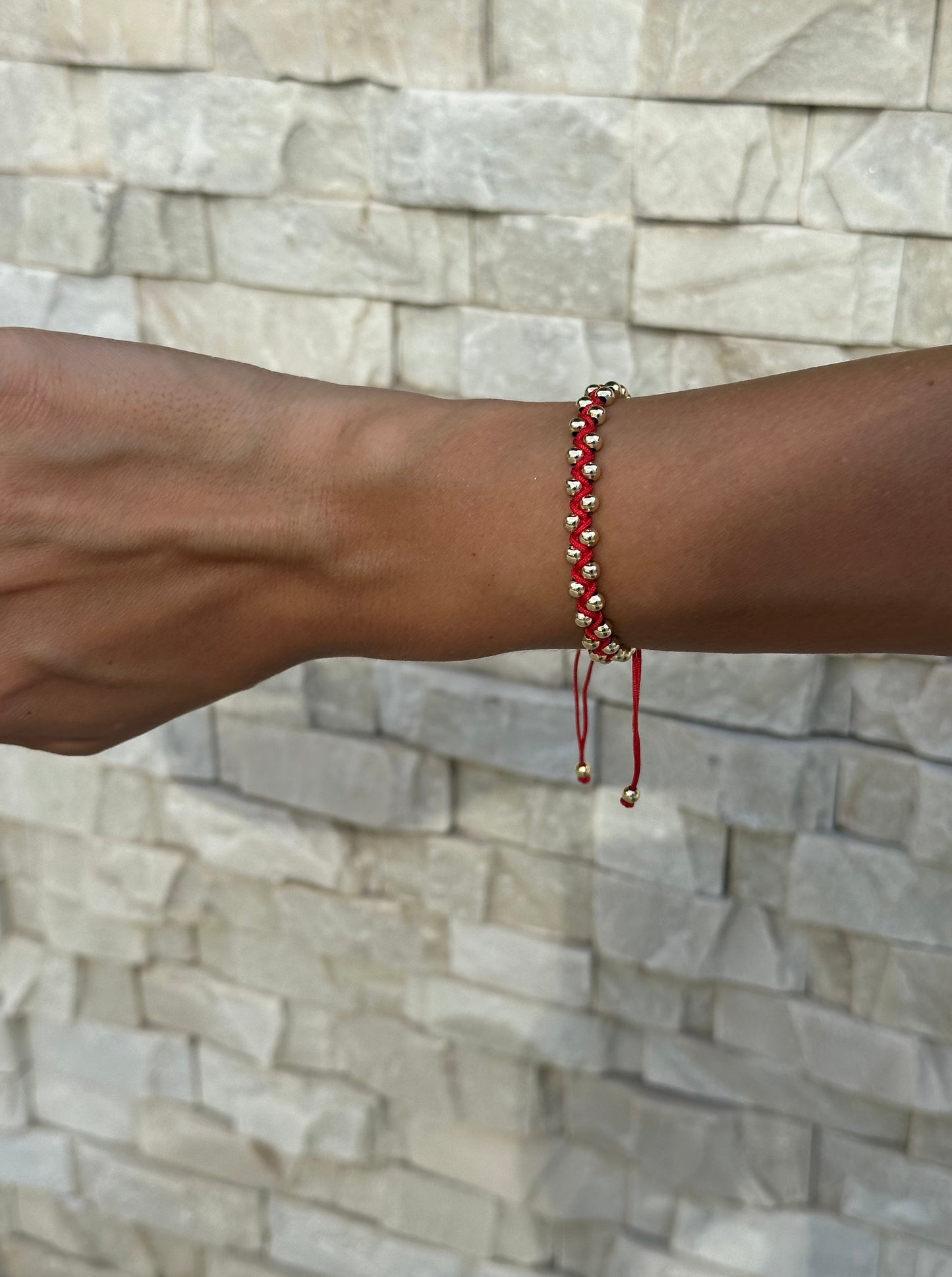 Braided bracelet medium 'Red w/gold details'