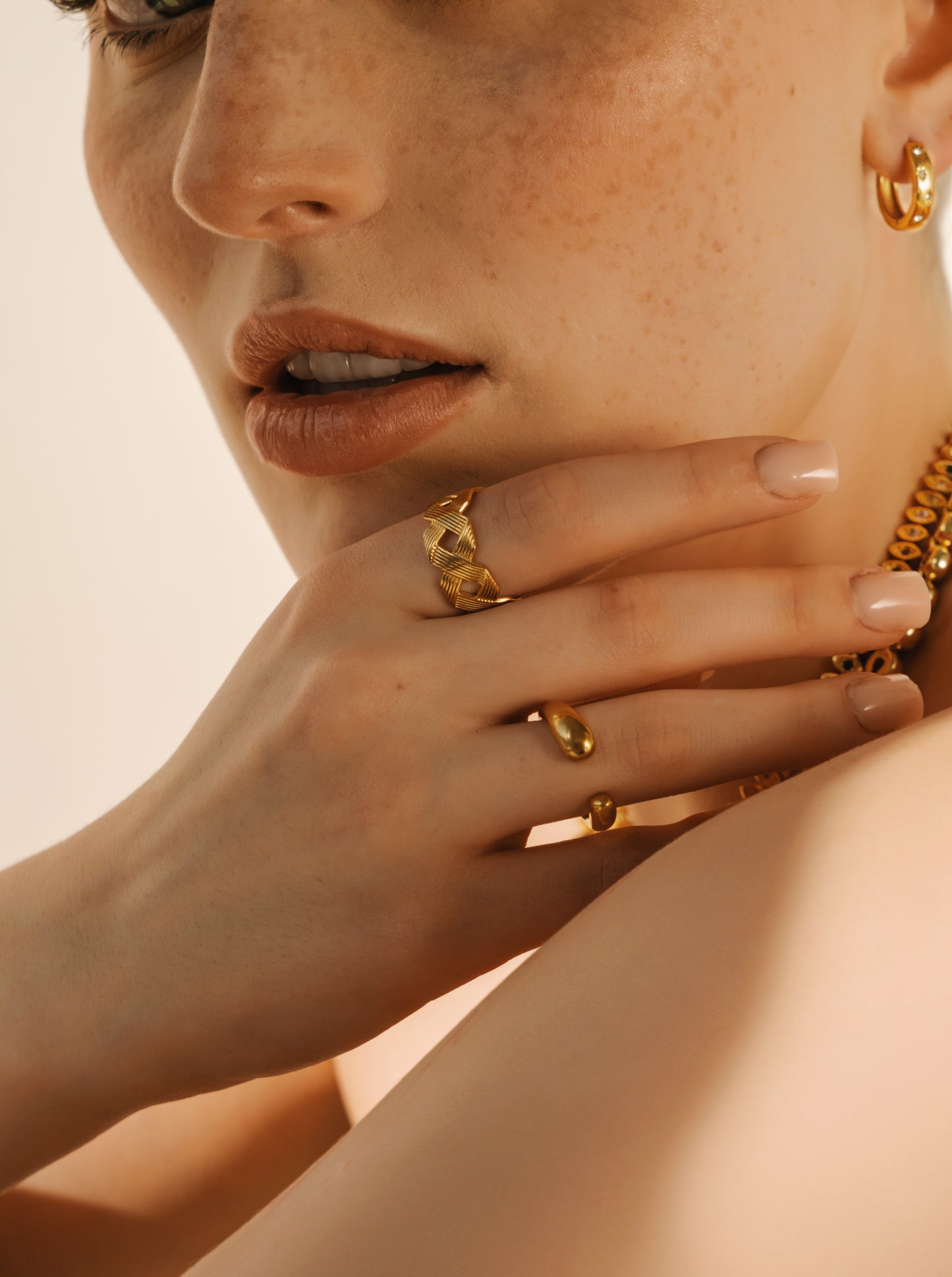 Adjustable statement ring round small