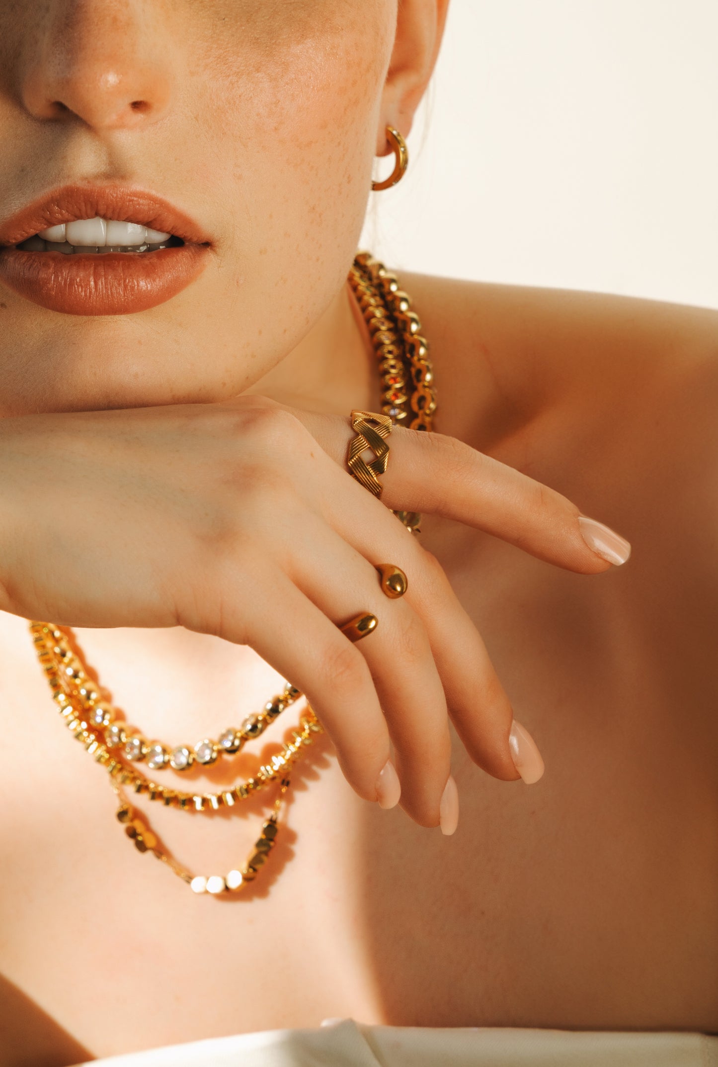 Adjustable statement ring round small